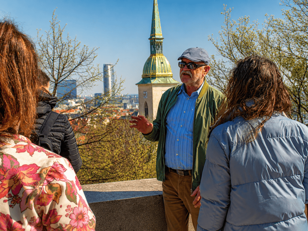 Guide talking to travelers near St Martin's Cathedral, Bratislava