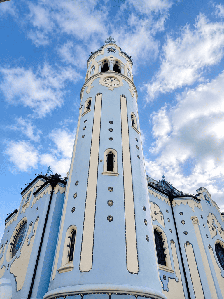 Blue Church tower in Bratislava against a bright sky