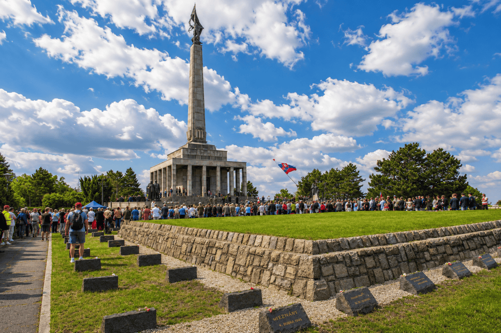 Crowd gathered at Slavin memorial gravestones in Bratislava