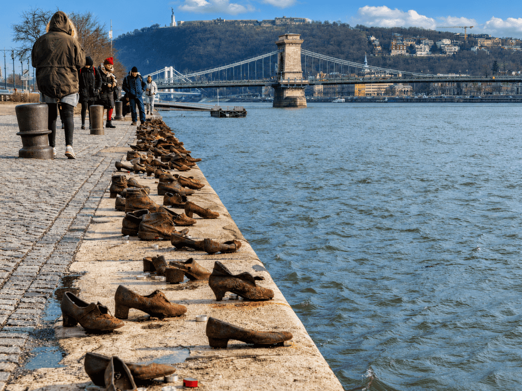 Shoes on the Danube memorial and the Chain Bridge in Budapest